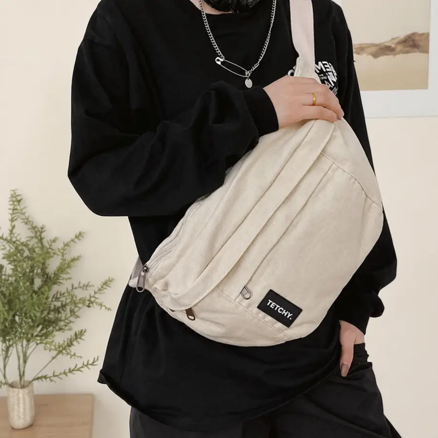 TETCHY. · Bags Multi Compartment Sling Bag
